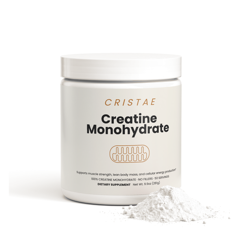 Cristae Creatine Monohydrate tub beside a mound of unflavoured creatine powder